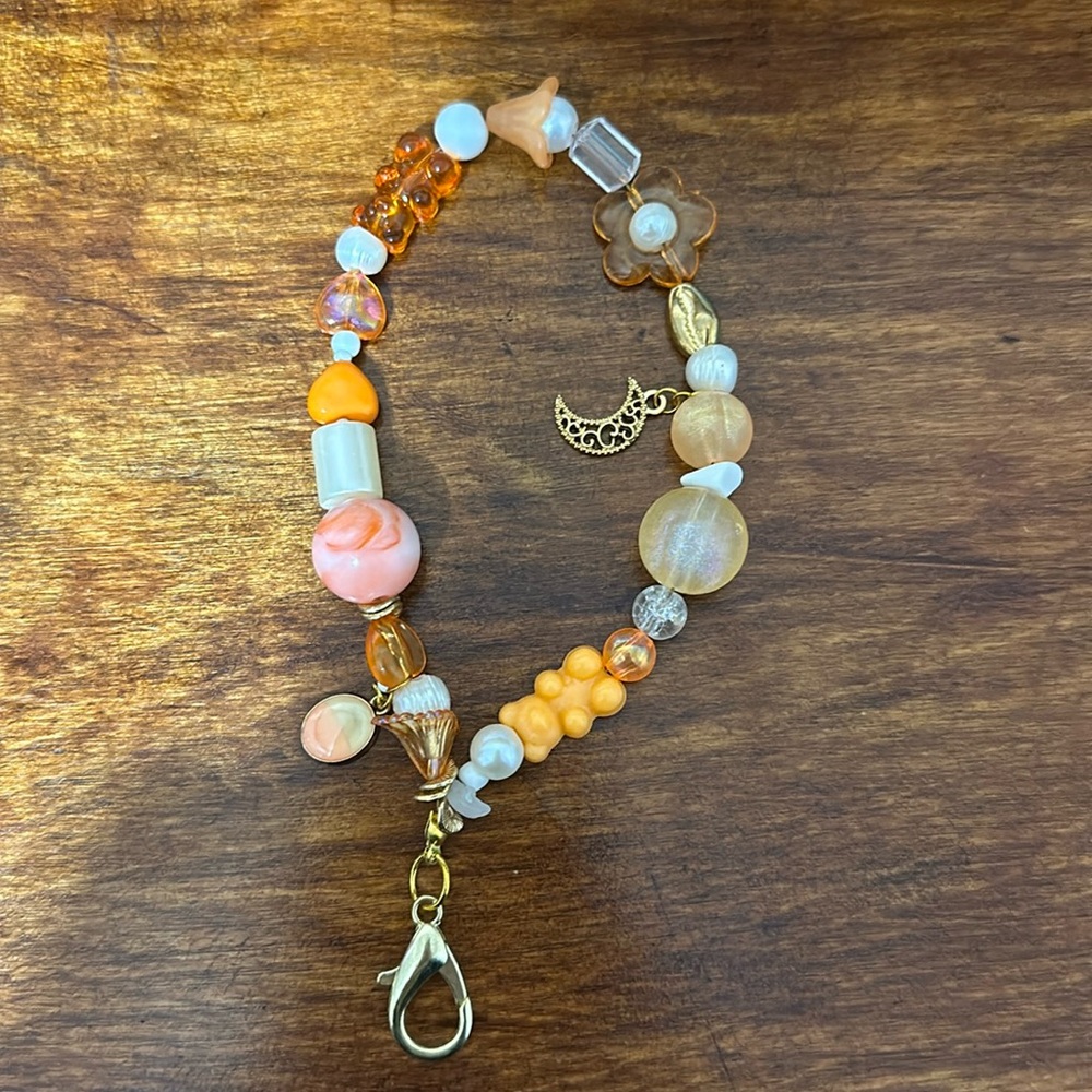 Handmade orange beaded keychain